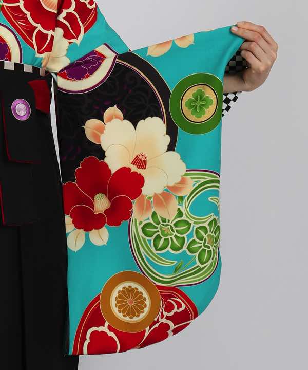 卒業式袴レンタル | ターコイズブルー地に椿と花丸文 黒袴