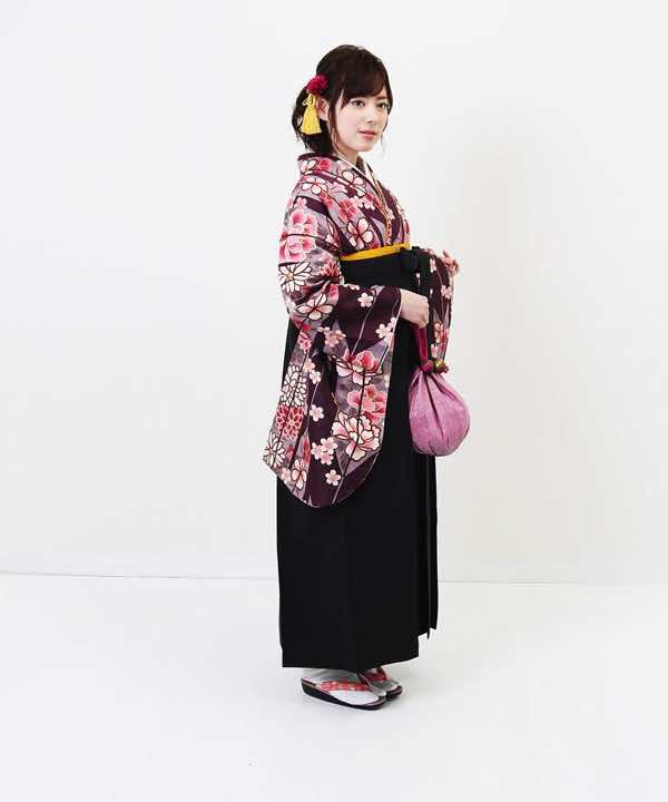 卒業式袴レンタル | 茶紫の大矢絣×黒袴(黄色の半巾帯)