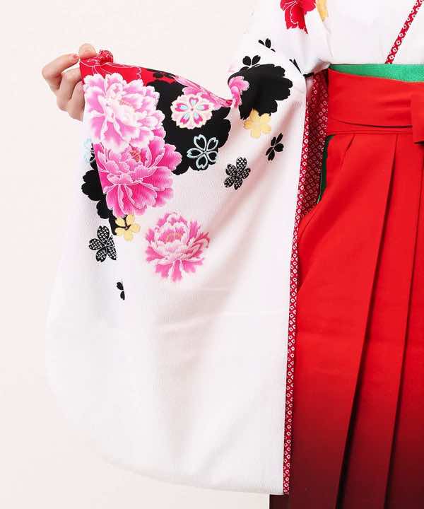 卒業式袴レンタル | ピンクと赤の牡丹にシルエット 赤暈し袴