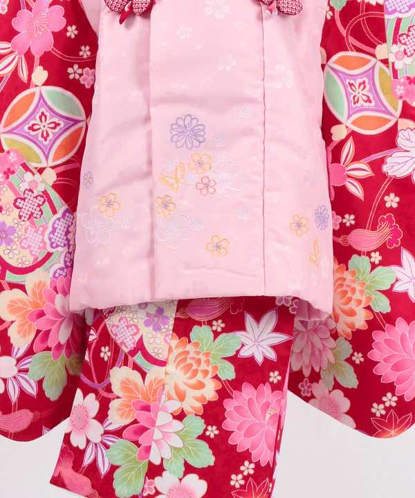 七五三(三歳)レンタル | 赤地に七宝文と季節の花々　小花の薄ピンク被布